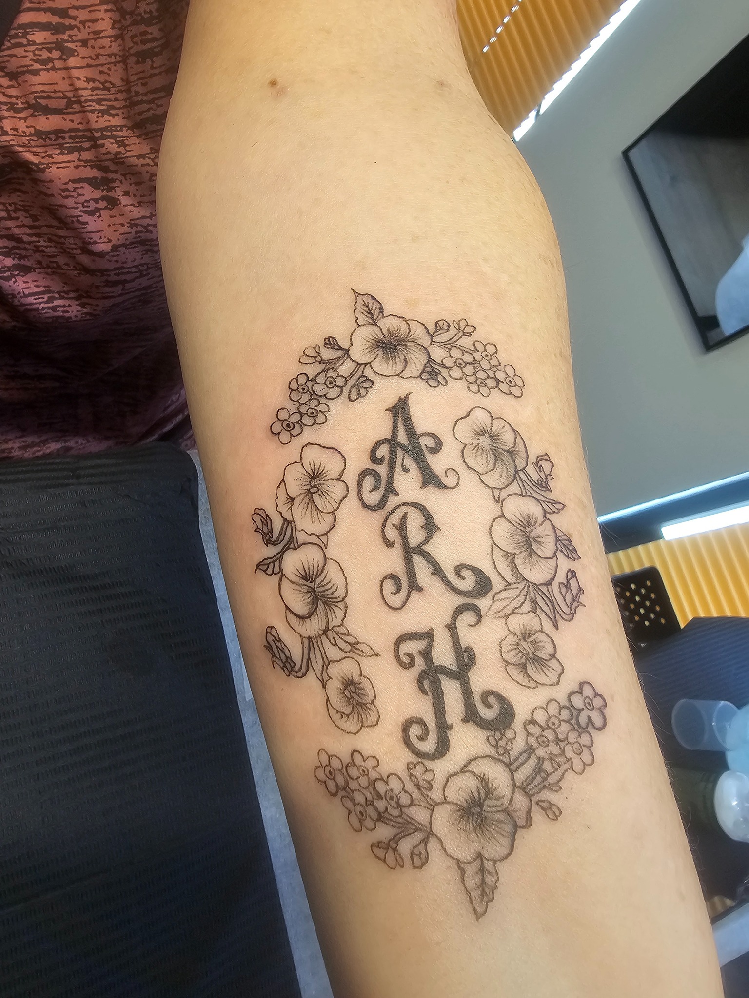 ARH Initials surrounded by flowers