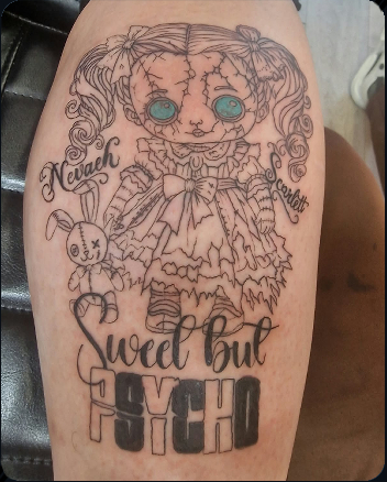 Creepy stitched doll tattoo with bunny and Sweet but Psycho lettering