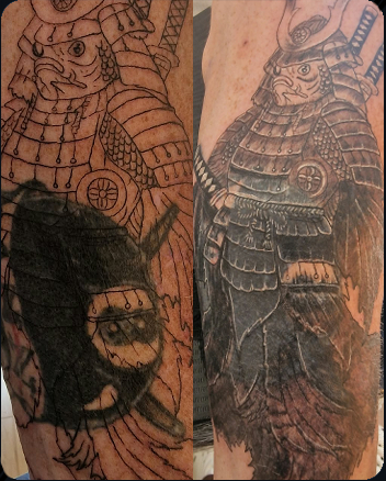 Black and grey Japanese samurai warrior tattoo with detailed armour and shading