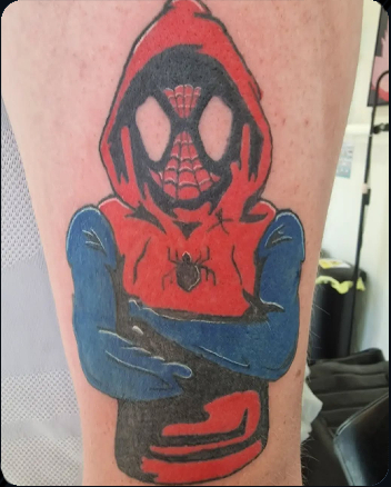 Hooded Spider-Man inspired character tattoo in red, blue and black